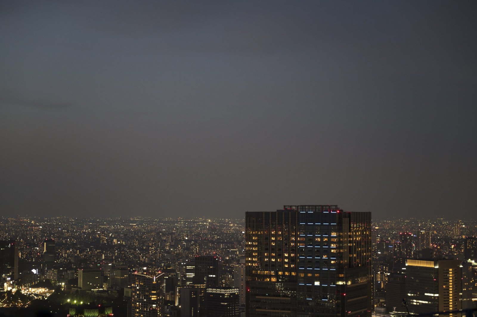 high-angle-beautiful-city-buildings-nighttime-min